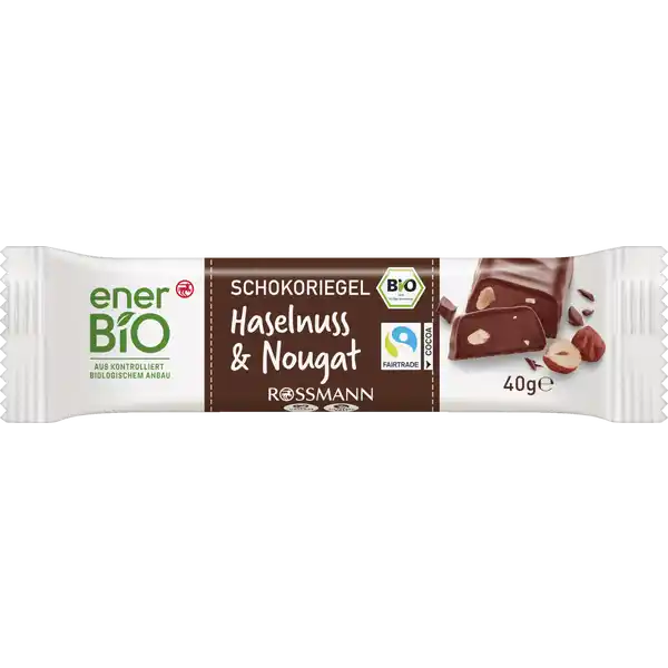 enerBiO Schokoriegel Haselnuss & Nougat: Цвет: Produktbeschreibung und details Vom kleinen BioHunger gepackt Wir riegeln das Unser knackignussiger enerBiO Schokoriegel mit Haselnuss und Nougat nascht sich mit kstlicher Bio Zartbitterschokolade und  Haselnssen auch in jedes vegane und glutenfreie Herz Klingt nach einem fairen Deal fr den kleinen Hunger  und ist zustzlich auch aus Fairtrade Kakao mit Mengenausgleich hergestellt Mehr Infos unter fairtradedeutschlanddesiegel Alle Produkte unserer ROSSMANNMarke enerBiO stammen aus kontrolliert biologischem Anbau Durch eine schonende sorgfltige Verarbeitung erhalten wir hierbei sowohl die Hochwertigkeit als auch den natrlichen Geschmack Zudem lassen wir unsere Produkte regelmig durch unabhngige Institute berprfen  so gewhrleisten wir eine gleichbleibende Qualitt Lebensmittelunternehmer Name Dirk Rossmann GmbH Adresse Isernhgener Strae   Burgwedel wwwrossmannde Bio Zertifikat DEKO UrsprungslandHerkunftsort NichtEULandwirtschaft Testurteile Qualittssiegel ampamp Verbandszeichen Rechtlich vorgeschriebene Produktbezeichnung Bio Haselnussriegel mit Nussnougat und Haselnussstcken in  Zartbitterschokolade Zutaten Rohrohrzucker  HASELNSSE  Kakaomasse Kakaobutter BourbonVanilleschoten gemahlen Kann Spuren von anderen SCAHLENFRCHTEN  MILCH  SESAM und SOJA enthalten Nhrwerte Durchschnittliche Nhrwertangaben pro  g pro  Portion pro Riegel  g Energie  kj   kcal  kj   kcal Fett  g  g davon  gesttigte Fettsuren  g  g Kohlenhydrate  g  g davon  Zucker  g  g Ballaststoffe  g  g Eiwei  g  g Salz  g amplt  g Gebrauch Aufbewahrung und Verwendung Aufbewahrungs und Verwendungsbedingungen Vor Wrme geschtzt und trocken lagern
https://www.rossmann.de/de/lebensmittel-enerbio-schokoriegel-haselnuss-und-nougat/p/4305615903866