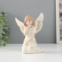 Сувенир керамика "Девочка-ангел в белом платье с узорами сидит" 10х7х13 см: 