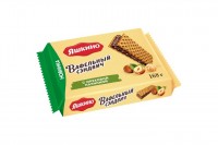 «Яшкино», вафельный сэндвич с ореховой начинкой, 168 г: Цвет: 20% хрустящей вафли, 80% шоколадно-ореховой начинки! – Из муки высшего сорта. – Начинка с отборным фундуком и фундучной пастой.
Описание товара
Энергетическая ценность на 100 г
Белки
6 г
Жиры
30 г
Углеводы
57 г
Калории
520 ккал
Характеристики
Торговая марка
Яшкино
Производитель
ООО 'КДВ Яшкино'
Страна производства
Россия
Условия хранения
хранить при температуре (18 ± 3) °С и относительной влажности воздуха не более 70 %.
Вес
168 г
Артикул
РКВ213
Стандарт
СТО 00356151-003-2014
Ветеринарный контроль
Нет
Упаковка
фасованный
Состав продукта
сахар, масла растительные (пальмовое, подсолнечное, пальмоядровое); мука пшеничная, тёртые ядра орехов обжаренных: фундука; сыворотка молочная сухая, какао-порошок, ядра орехов фундука обжаренные дробленые, вода питьевая, мука рисовая, краситель: сахарный колер І простой; крахмал кукурузный, соль, продукты яичные, эмульгаторы: лецитины (рапсовый, соевый); ароматизатор, разрыхлители: гидрокарбонат натрия, гидрокарбонат аммония; солод ржаной сухой, антиокислитель: Е306. Возможно наличие диоксида серы, арахиса.