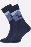 Мужские махровые носки Брестские: Цвет: т.синиймеланж
Теплые махровые носки выполнены из мягкого хлопка. Мужские носки представлены в синем цвете и украшены рисунком олень. Носки идеальны для уютных зимних вечеров, прогулок и путешествий в зимние каникулы.
Нежная хлопковая пряжа делает носочки прочными и идеальными для прохладного времени года. Благодаря полиэстеру и эластану в составе они сохраняют форму и цвет даже после частых стирок.
Махровые термоноски идеальны для мужчин и подростков. Синие трикотажные носки нежно облегают ноги и не сползают при активных движениях благодаря плотной вязке. 
Длинные термо носки с принтом согреют ножки в морозные дни. Утепленные носки из трикотажа будут отлично смотреться в тандеме с домашними тапочками.